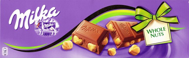 Milka duze kokarda whole nuts 139kcal_cr
